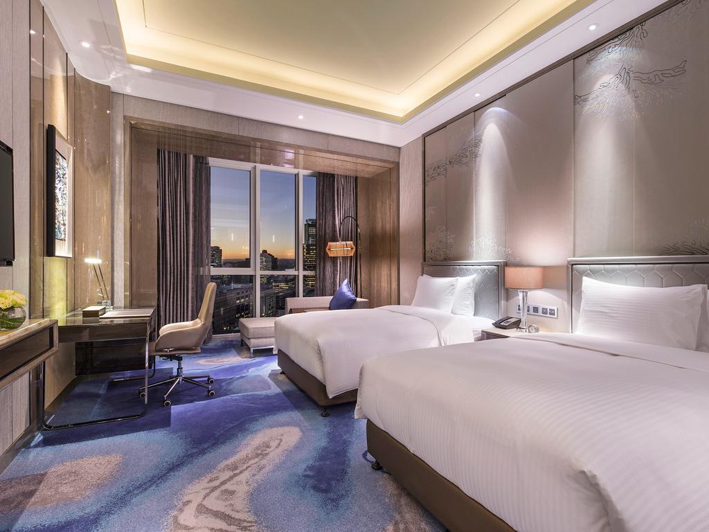 Готель Pullman Yantai Center Екстер'єр фото