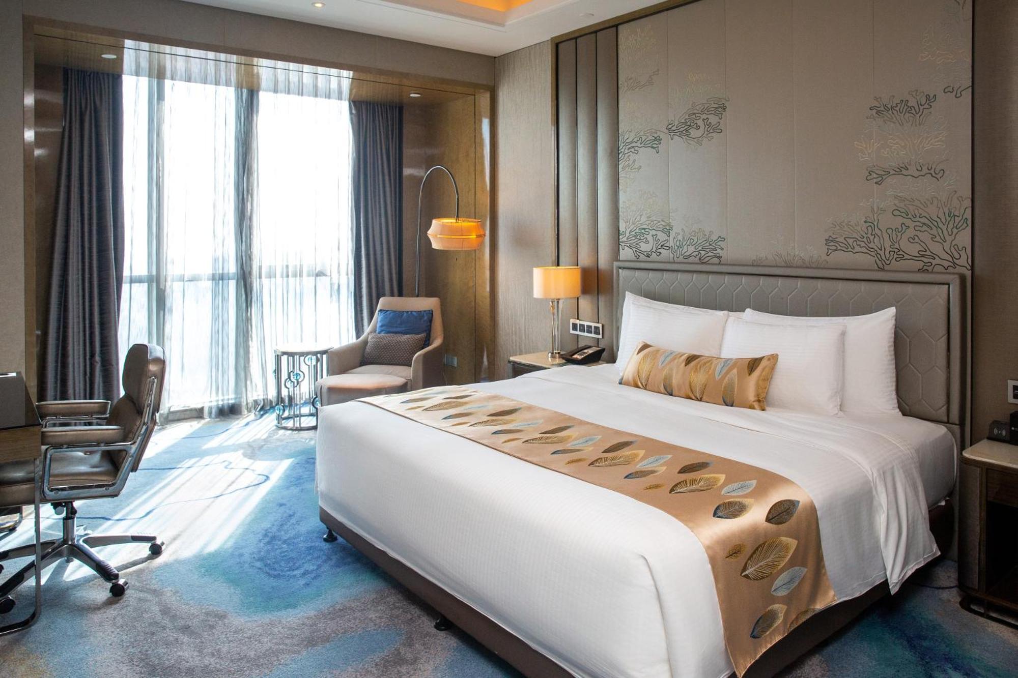 Готель Pullman Yantai Center Екстер'єр фото